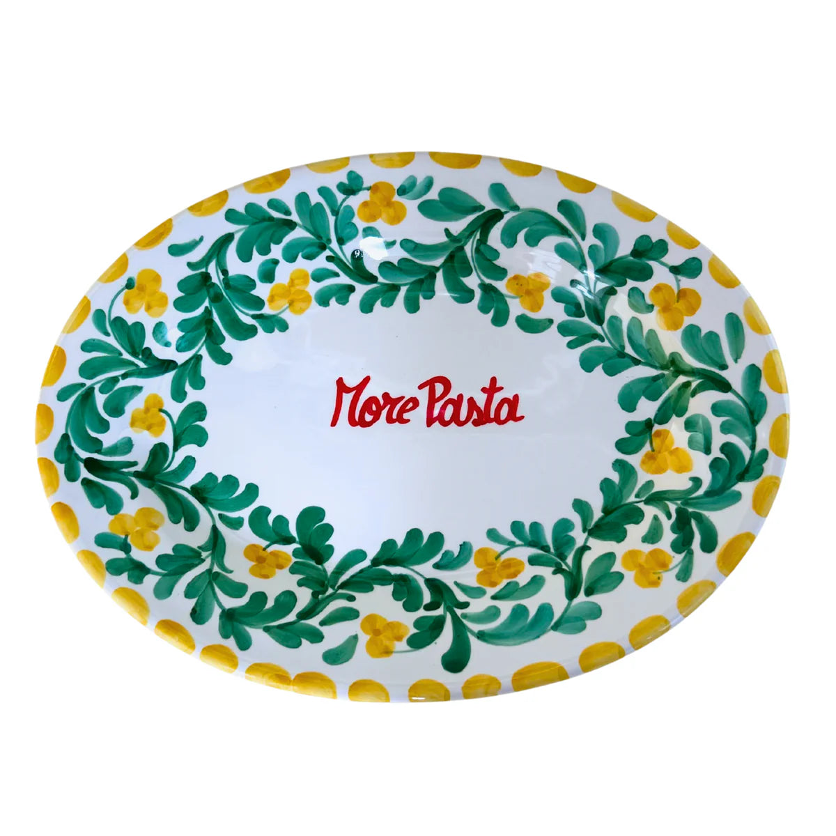 Decorative plate with green leaves, yellow flowers, and 'More Pasta' text on a white background