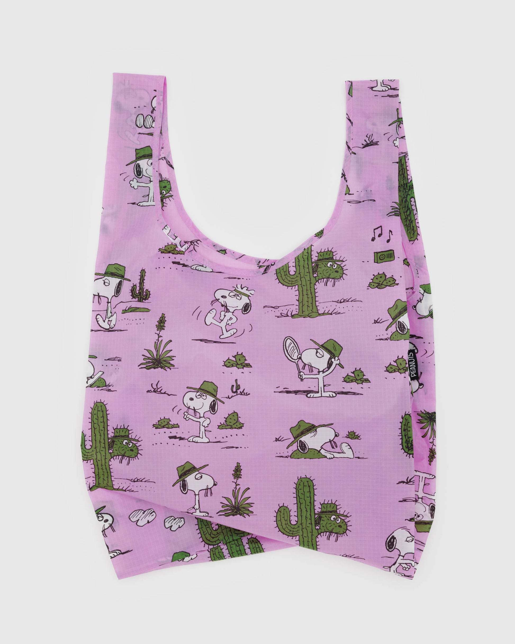 BAGGU X Peanuts reusable bag in pink spike pattern 