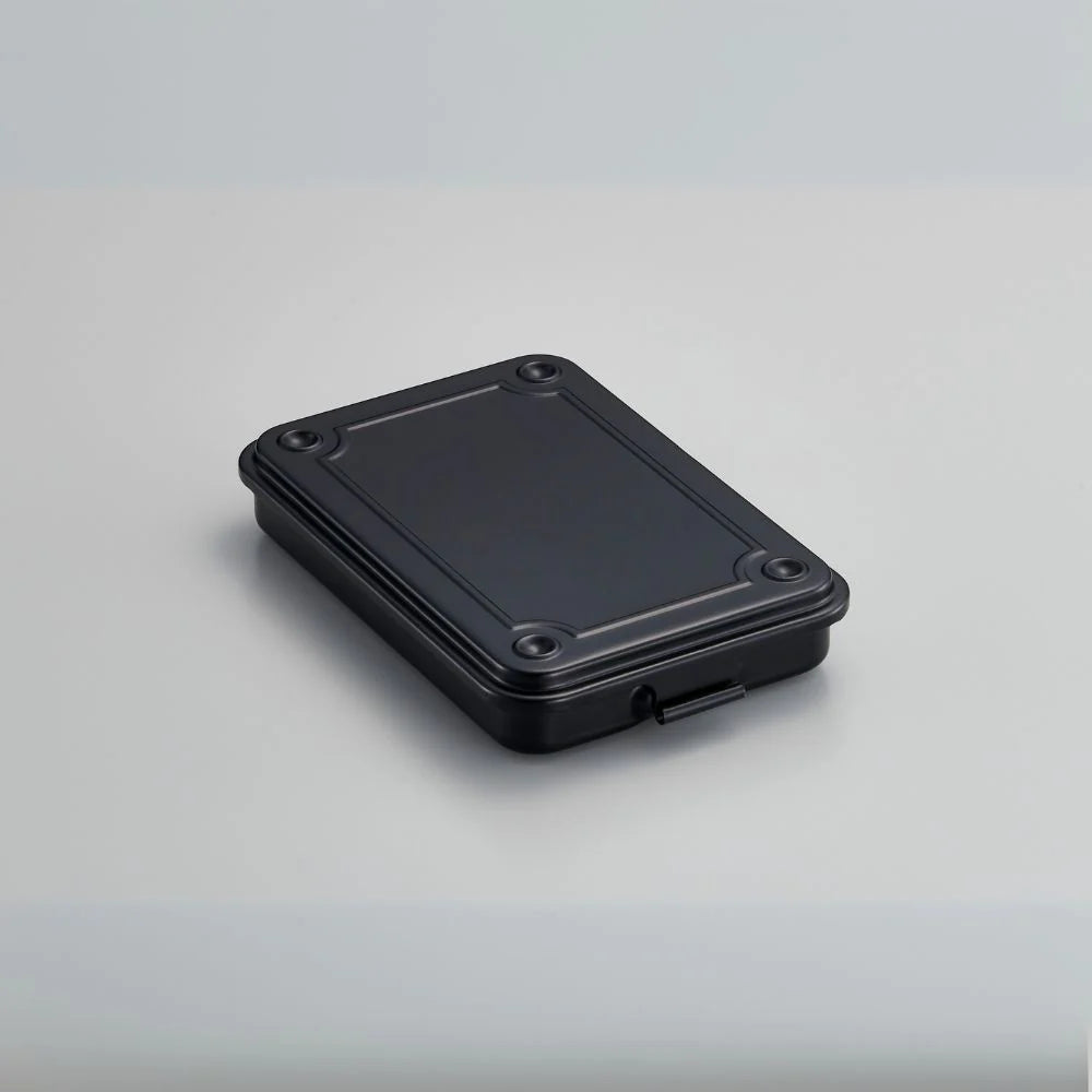 Black rectangular plastic case on a gray background