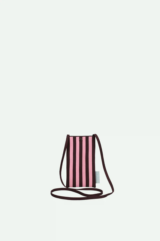 Pink striped crossbody bag on a light gray background