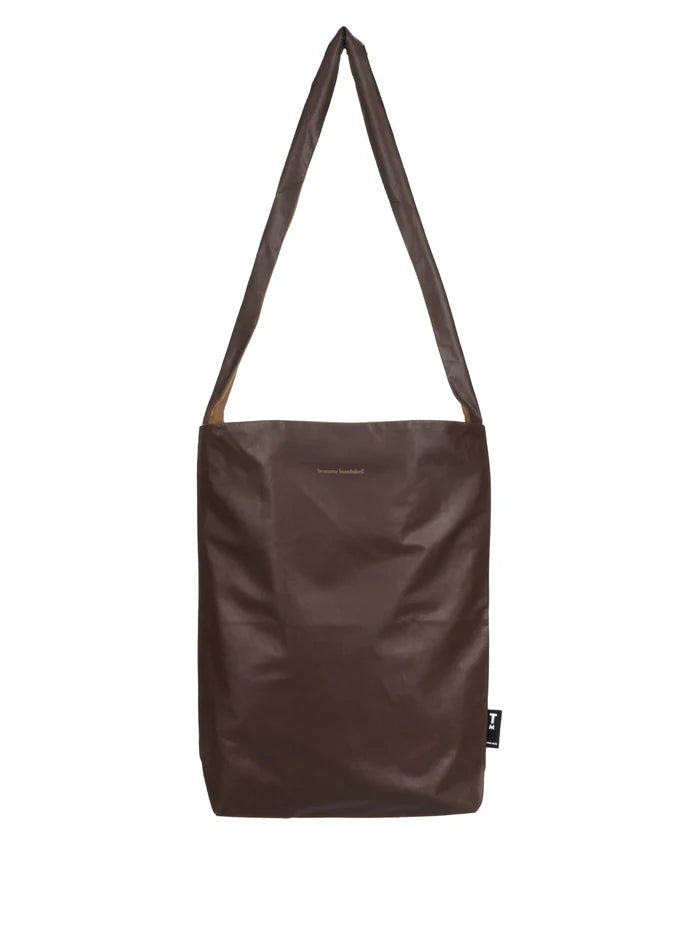 Brown shoulder bag on a white background