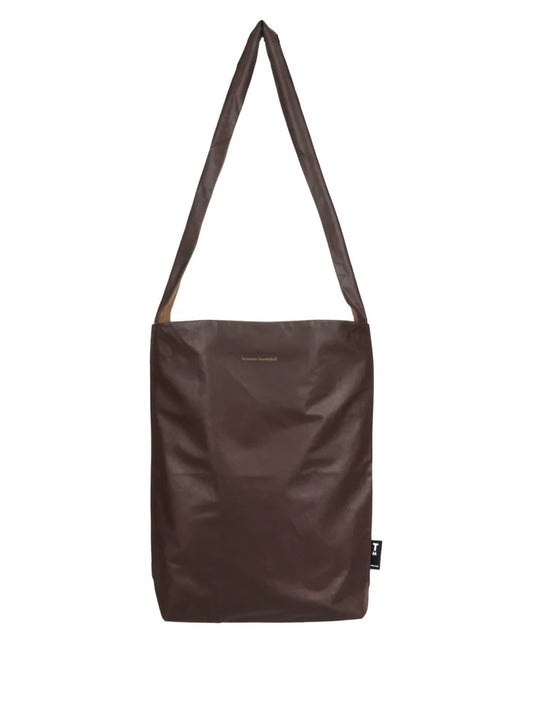 Brown shoulder bag on a white background