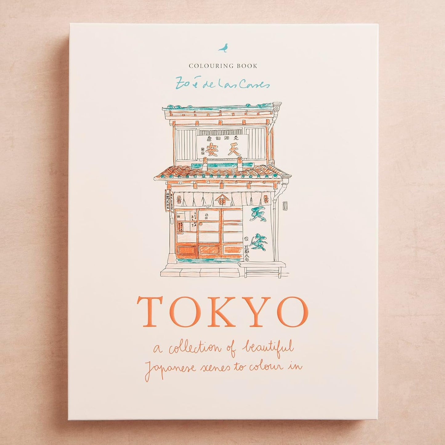 A hardcover coloring book titled 'Tokyo: a collection of beautiful Japanese scenes to colour on a beige background 