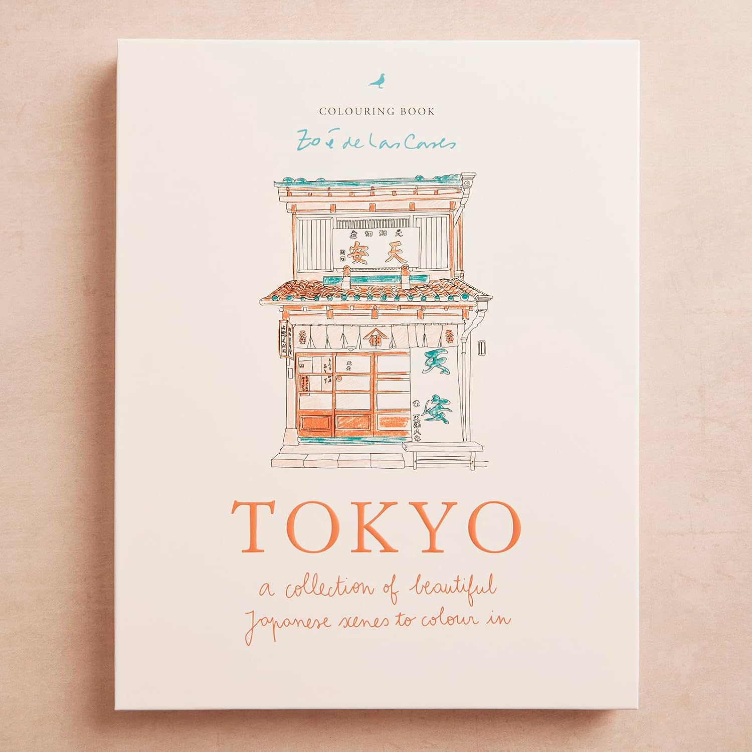A hardcover coloring book titled 'Tokyo: a collection of beautiful Japanese scenes to colour on a beige background 