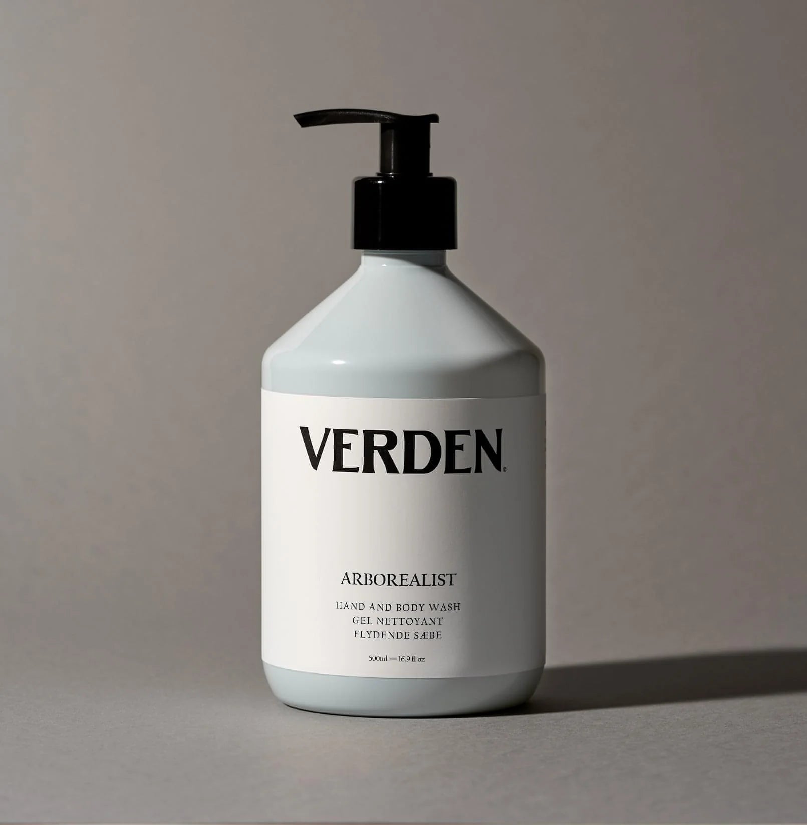 Baby Blue bottle with black pump labeled 'VERDEN' on a gray background
