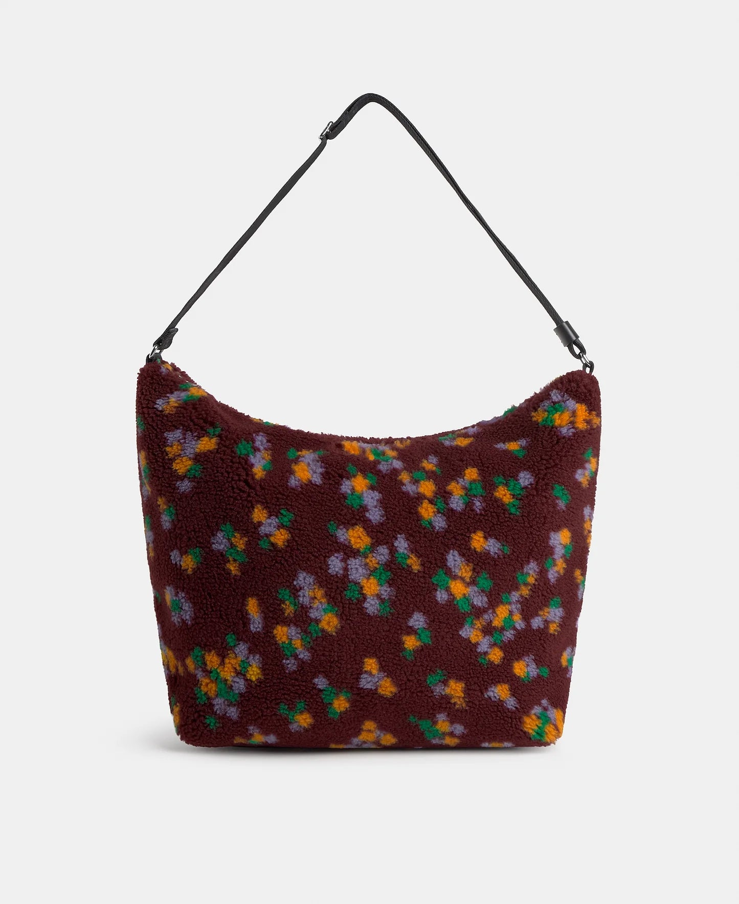 Floral patterned handbag on a light gray background