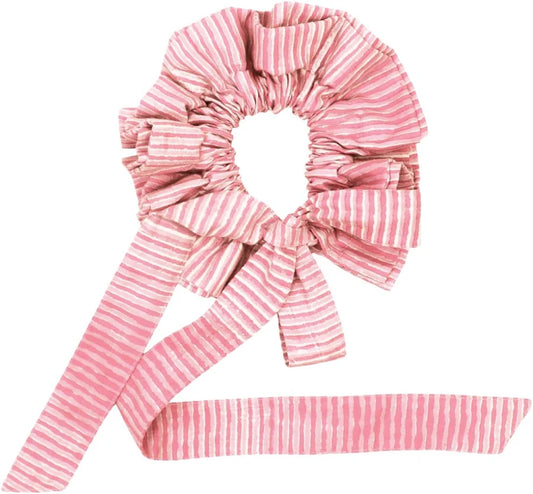 Pink and white striped scrunchie with a bow on a white background