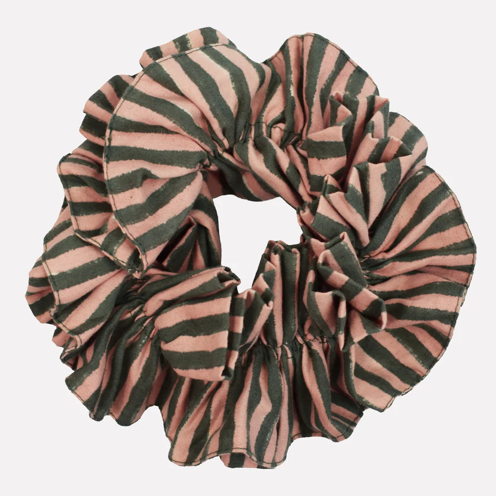 Pink and green striped scrunchie on a white background