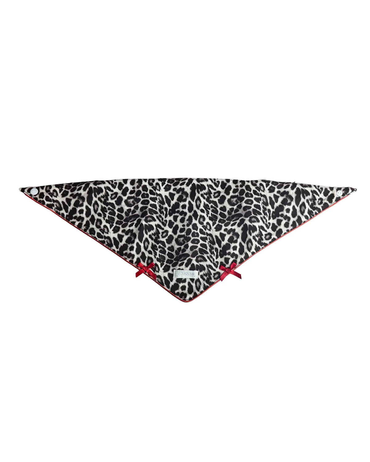 A triangular bandana featuring a black and white leopard print pattern with a thin red border and small red ties at the corners, displayed on a solid white background.