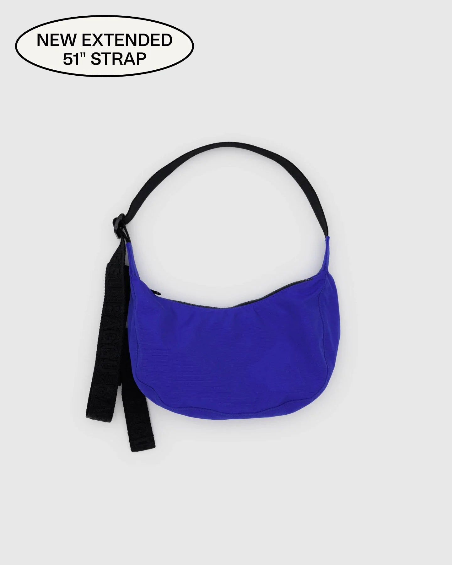 small crescent nylon bag in lapis a vibrant blue colour 