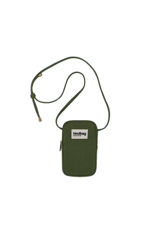 Green crossbody bag with a visible brand label on a white background
