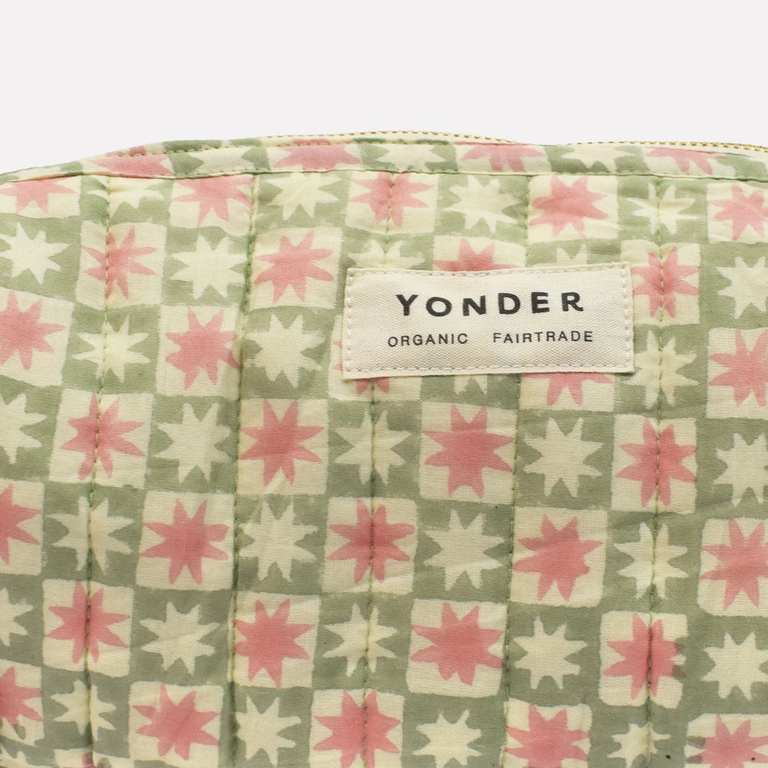 Patterned fabric with a 'Yonder' label on a white background