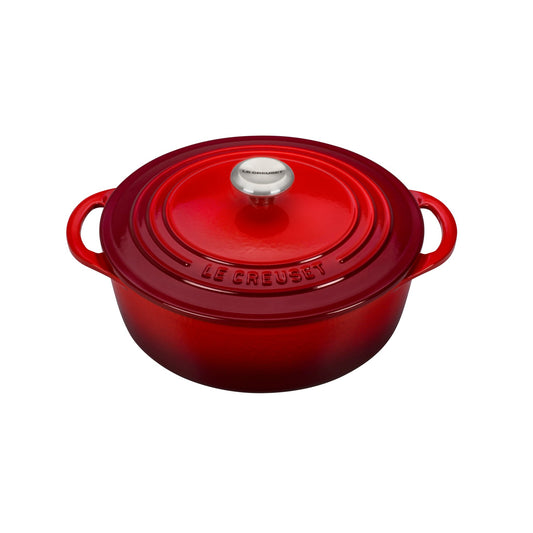 a red casserole dish with a matching lid