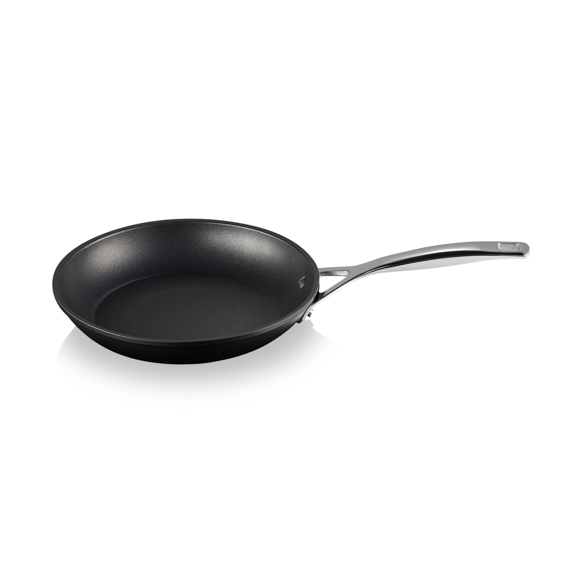 A black frying pan with a stainless steel handle