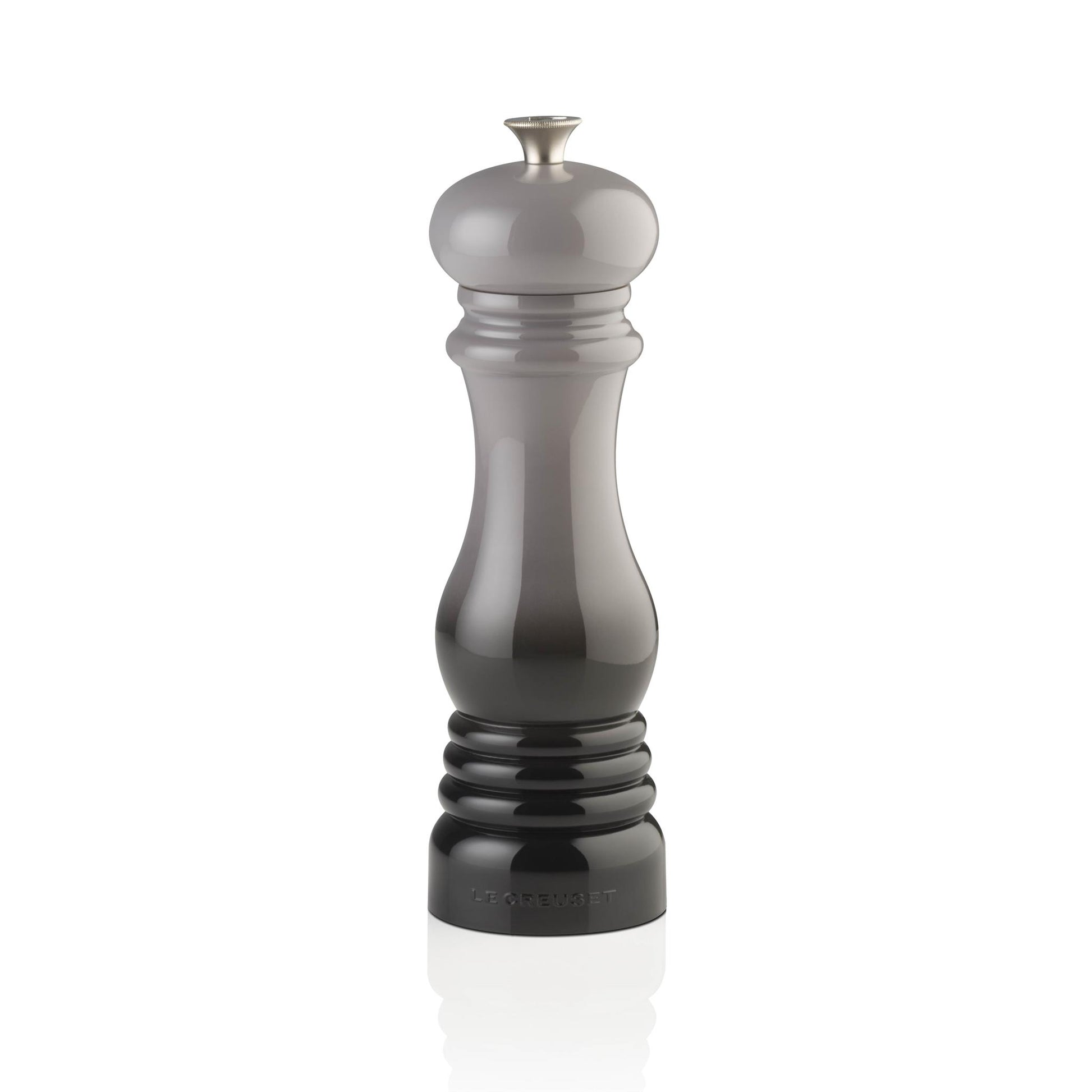 A pepper mill coloured in black and grey ombre with a classic curved design