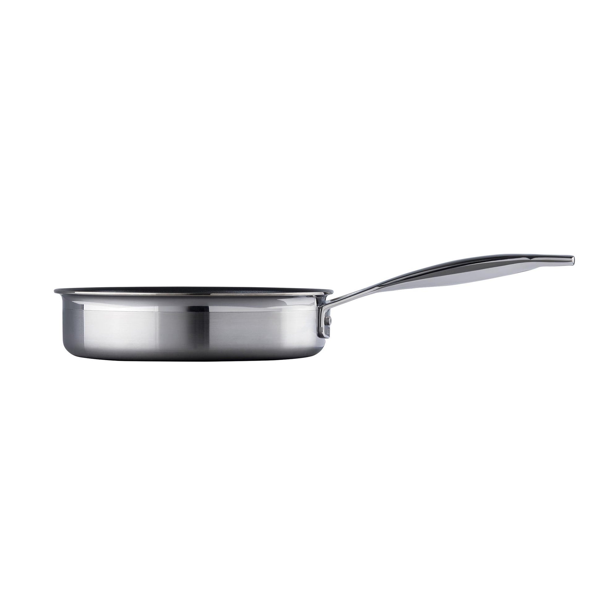 A side view of the Le Creuset saute pan with stainless steel exterior and handle and black non stick lining