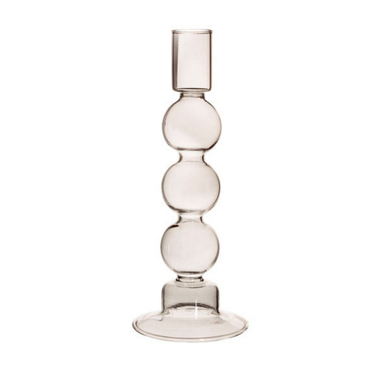 a grey candle stick holder with three spheres up the length of it
