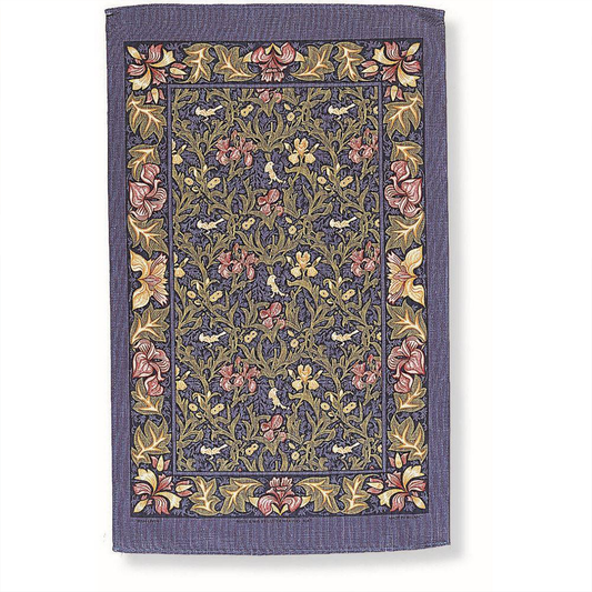 a blue tea towel with an intricate design of red and yellow irises and small yellow birds