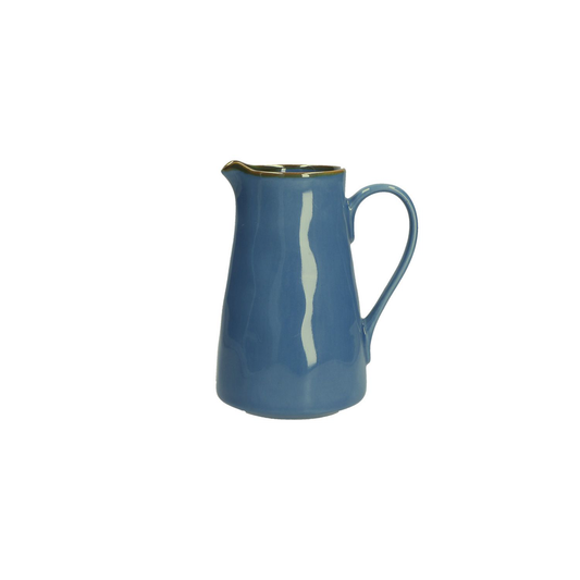 A small blue jug with a rustic glazed finish