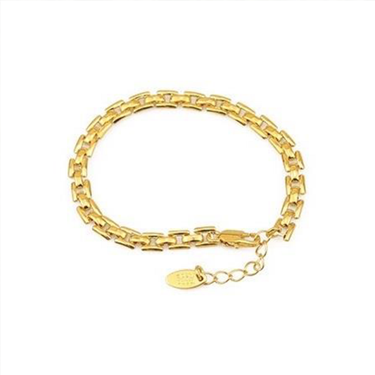 a gold chain bracelet with a lobster claw clip closure