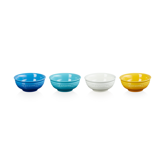 four small dip bowls in different colours - two in shades of blue, one white and one yellow
