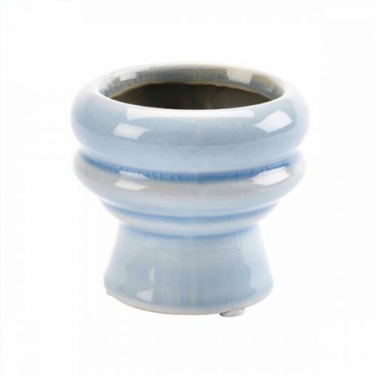 a small blue urn shaped plant pot