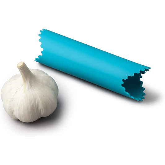 the peeler with a bulb of garlic