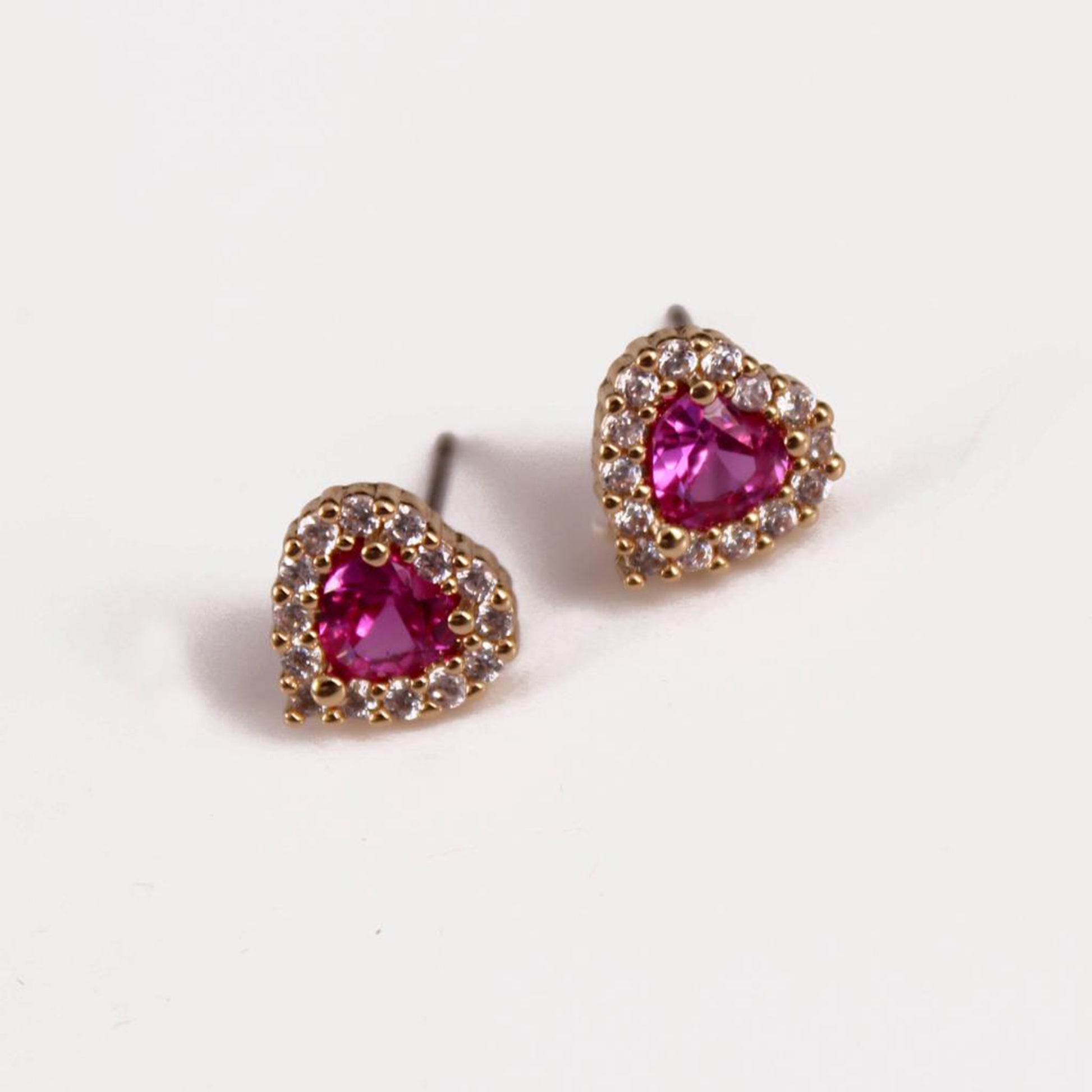heart stud earrings with cubic zirconia stones in pink and clear 
