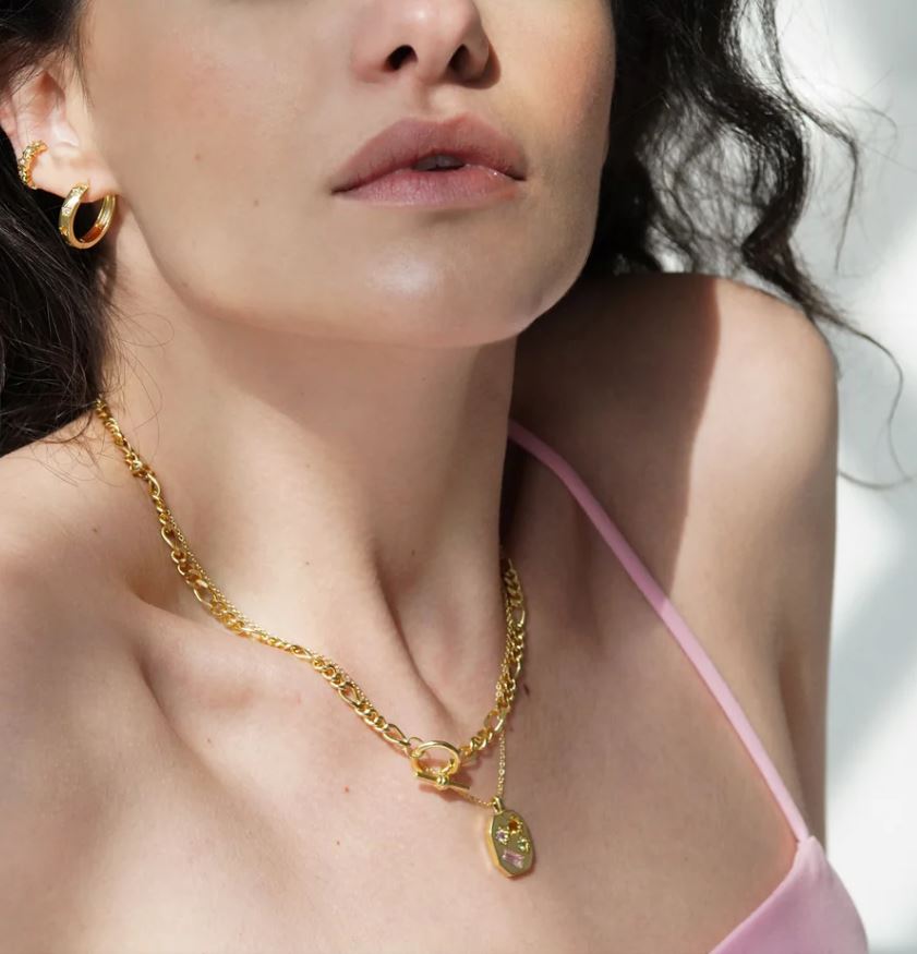 model wears the necklace
