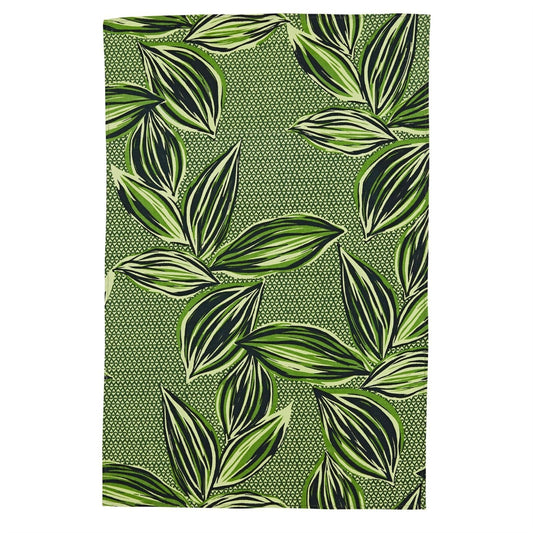 a green cotton tea towel with a bold leaf design
