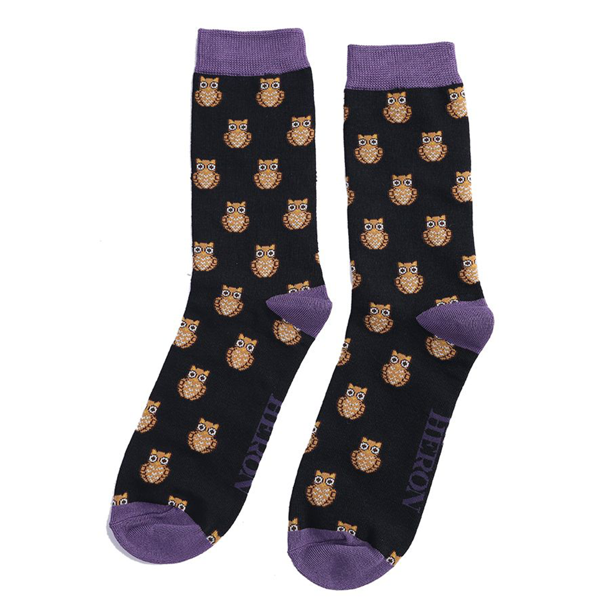 black and purple socks with brown owls on them