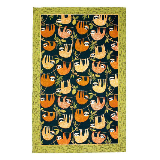a cotton tea towel featuring sloths hanging from trees with a green border