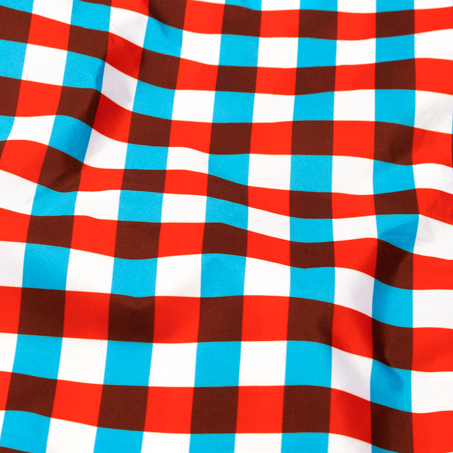a close up of the white, blue and red check pattern